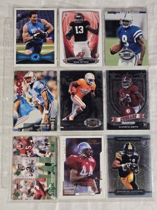 Lot of 9 Football Cards Featuring Marvin Harrison, Mike Evans, Emmanuel Sanders, and Others including Rookie Cards.