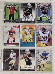 Lot of 9 Football Cards featuring Khalil Mack, Derek Carr, and more. Includes notable rookies like Isaac Bruce, Amari Cooper, Jameis Winston, and Nick Bosa