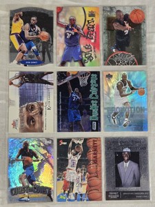 Lot of 9 Kevin Garnett Basketball Cards Featuring Holo and Special Editions.