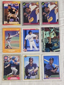 Lot of 9 Baseball Cards Featuring Rafael Palmeiro, Tom Glavine, Craig Biggio, Manny Ramirez, and others. Includes Rookie cards