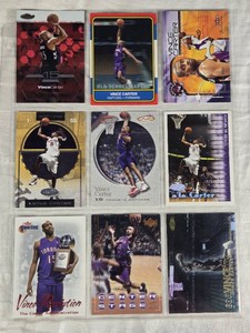 Lot of 9 Vince Carter Basketball Cards featuring various sets, including Center Stage, Fleer, and others.