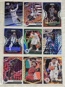 Lot of 9 Basketball Cards featuring Collin Sexton, DAngelo Russell, Chris Paul, Derrick Rose, Jamal Murray, Trae Young, Donovan Mitchell, and Kyrie Irving