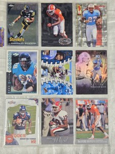 Lot of 9 Football Cards Including DeAndre Hopkins, Emmanual Sanders, Fred Taylor, and Demaryius Thomas Including Some Rookie Cards