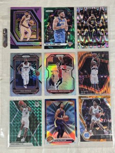 Lot of 9 Basketball Cards Featuring Players Like Paul George, Russell Westbrook, and Kevin Durant with Holo and Numbered Variants.