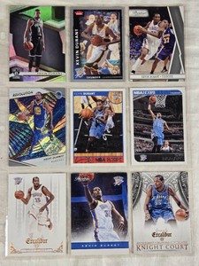 Lot of 9 Kevin Durant Basketball Cards Including Panini Excalibur, NBA Hoops, and Revolution Holo.