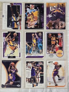 Lot of 9 Kobe Bryant Basketball Cards featuring brands such as Fleer, Upper Deck, and Topps with action shots and various card designs.
