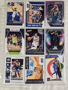 Lot of 9 Karl-Anthony Towns Basketball Cards including Panini Chronicles, NBA Hoops, Prestige, and Threads.