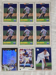 Lot of 8 Greg Maddux Baseball Cards including Duracell Inserts and Zenith Special Edition.
