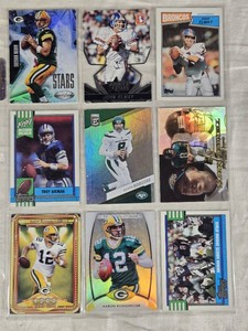 Lot of 9 Football Cards Featuring Aaron Rodgers, John Elway, and Troy Aikman. Includes cards with special features such as Rookies, Stars, and Holo.