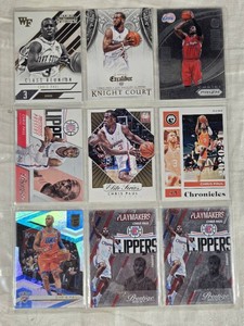 Lot of Chris Paul Basketball Cards Featuring Panini and Prestige Collections including Holographic and Team Tribute Versions.