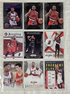 Lot of 9 Damian Lillard Basketball Cards featuring Excalibur, Select, Hoops, and more with special inserts like Knight Court and Frequent Flyers.