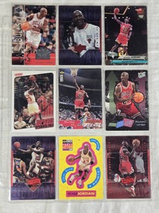 Lot of 9 Michael Jordan Basketball Cards featuring various brands, special editions, and designs, including Upper Deck and Fleer Ultra.