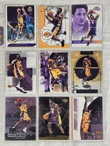 Lot of 9 Kobe Bryant Basketball Cards featuring various brands and designs, including Fleer, Upper Deck, and Metal cards