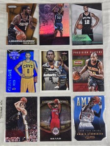 Lot of 9 Basketball Cards Featuring Players Including Kevin Love and LaMarcus Aldridge with Special Features like Holo and Limited Editions