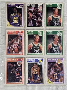 Lot of 9 Basketball Cards featuring Larry Bird, Reggie Miller, Dennis Rodman, Charles Oakley, Clyde Drexler, Karl Malone, and Earvin Johnson