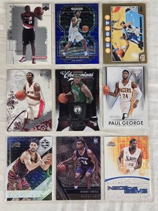Lot of 9 Basketball Cards Featuring Brandon Ingram, Paul George, Chris Bosh, Carmelo Anthony, Kevin Love, Dikembe Mutombo, Buddy Hield, Paul Pierce, and Zach Randolph