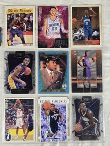 Lot of 9 Basketball Cards Featuring Dikembe Mutombo, Jusuf Nurkic, Stephon Marbury, DAngelo Russell, Joe Johnson, Chris Bosh, Grant Hill, Michael Conley, and Myles Turner