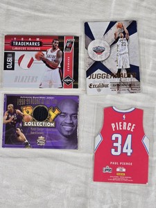 Lot of 4 Basketball Cards Featuring Paul Pierce, Vince Carter, Anthony Davis, and LaMarcus Aldridge - Includes Game-Worn Jersey Cards and Juggernauts Design. - Edge and Corner Damage