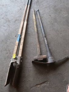 POST HOLE DIGGER, PICK AXE AND SLEDGE HAMMER