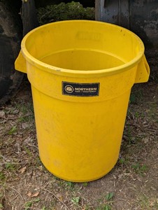 Yellow Brute Trash Can