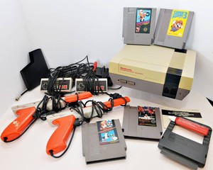Vintage Nintendo Entertainment System (NES) with Controllers, Zappers & 4 Games  Tested & Works
