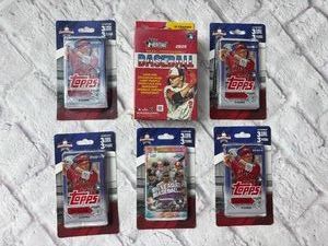 Lot of 6 Sealed Baseball Card Hanger Boxes Including (4) 2023 Topps Update Series Championship Collection, (1) 2023 Topps Big League Baseball Champion Collection, and (1) 2025 Topps Heritage