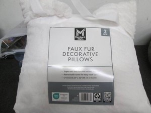 2 Faux fur decorative pillows...