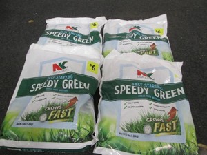 4 Three pond bags of grass seed...