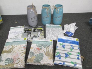 Decorative jars and tablecloths...