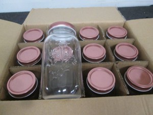 12 New canning jars with lids...