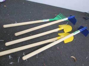 Lot of kids garden tools...