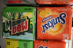 2 Cases of Pop 12-12oz cans Past Da...
