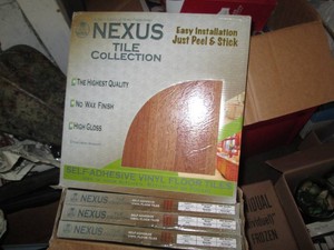 80 SF of peel n stick vinyl floor t...
