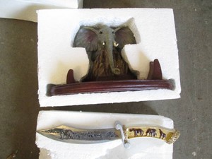 Collector elephant knife with stand...