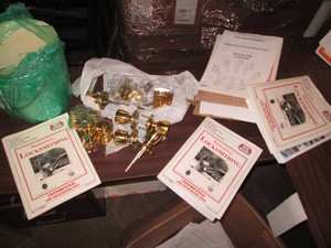 Bucket of door knobs and latches an...