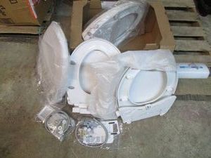 4 New bidet seats, 2 with hose conn...