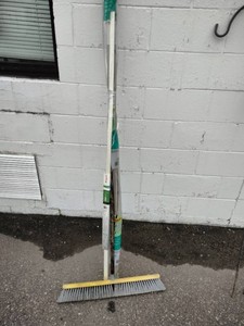 Heavy-duty push broom, Wiremold CordMate, and Vigoro Sturdy Bamboo Plant Stakes