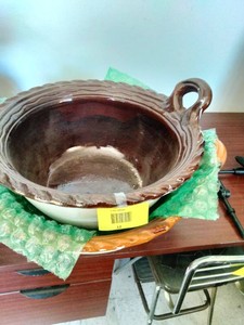 These are traditional Mexican clay pots, or cazuelas de barro, known for their brown glazed interior finish