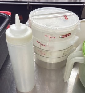 assortment of commercial kitchen measuring containers (L-Kitchen)