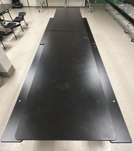 Black collapsible table on wheels with bench seating (L-Kitchen)