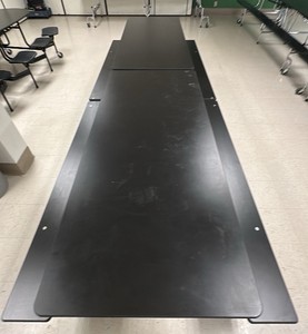 Black collapsible table on wheels with bench seating (L-Kitchen)
