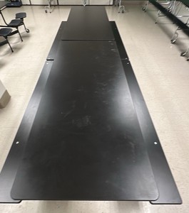Black collapsible table on wheels with bench seating (L-Kitchen)