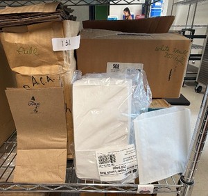 bag of brown bags, 25% full box of small white bags and full box of white paper lunch bags (L-Kitchen)