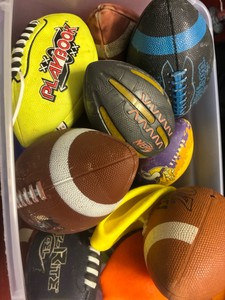 Tote of footballs (Gym)