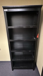 Black  dark wood cabinet with shelves