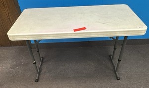 Lifetime white height adjustable folding table.