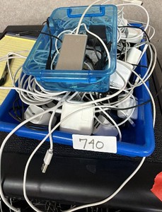 Box of Apple chargers and other cords