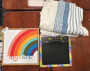 Lot of together sign, first day chalkboard sign, and 2 clothes