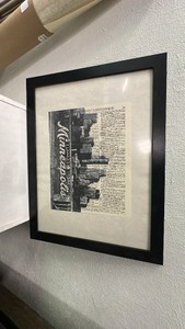 Newspaper style print of Minneapolis in a frame from IKEA model NYTTJA, 22509