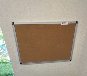 Pegboard with metal frame